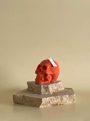 Orange skull candle 
